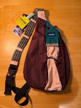 Kavu Rope Sling Bag in Burgundy with Teal and Pink Trim